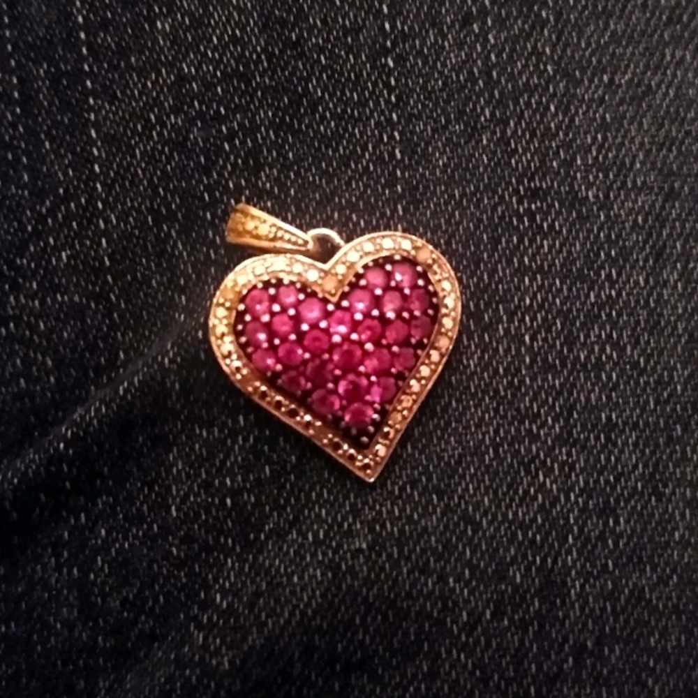 Silver heart charm